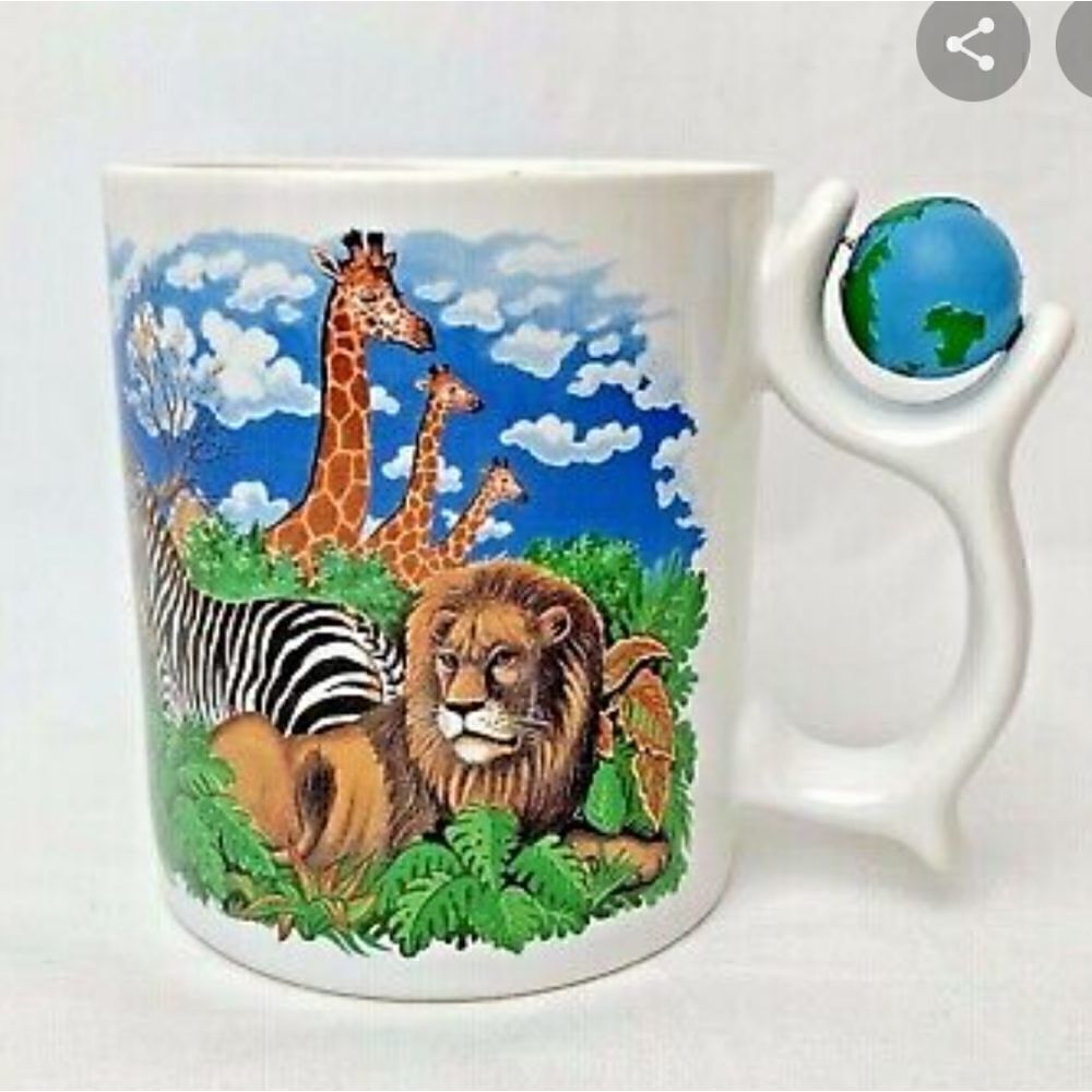 IN SEARCH OF.  RPM SPINNER  ANIMAL WORLD MUG MADE BY THE TALUS CORP. (1995)